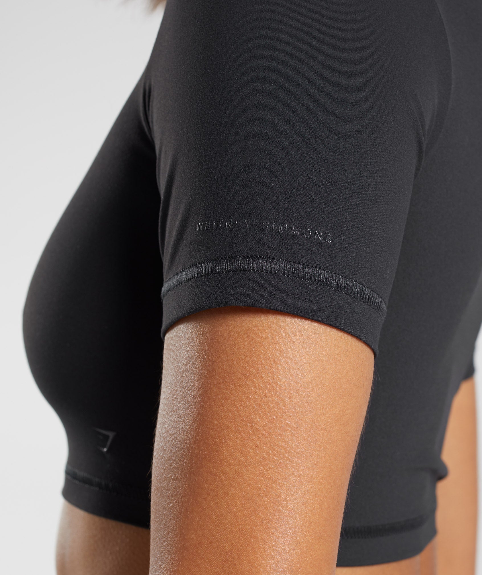 gymshark-whitney-short-sleeve-crop-top-black-ss23