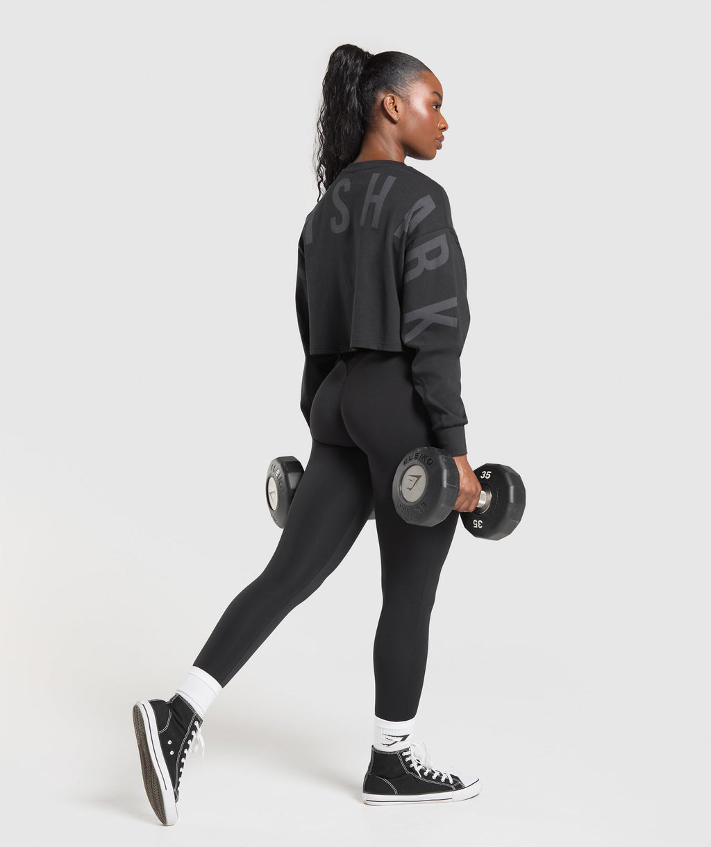 gymshark-gymshark-wordmark-graphic-long-sleeve-top-black-ss25