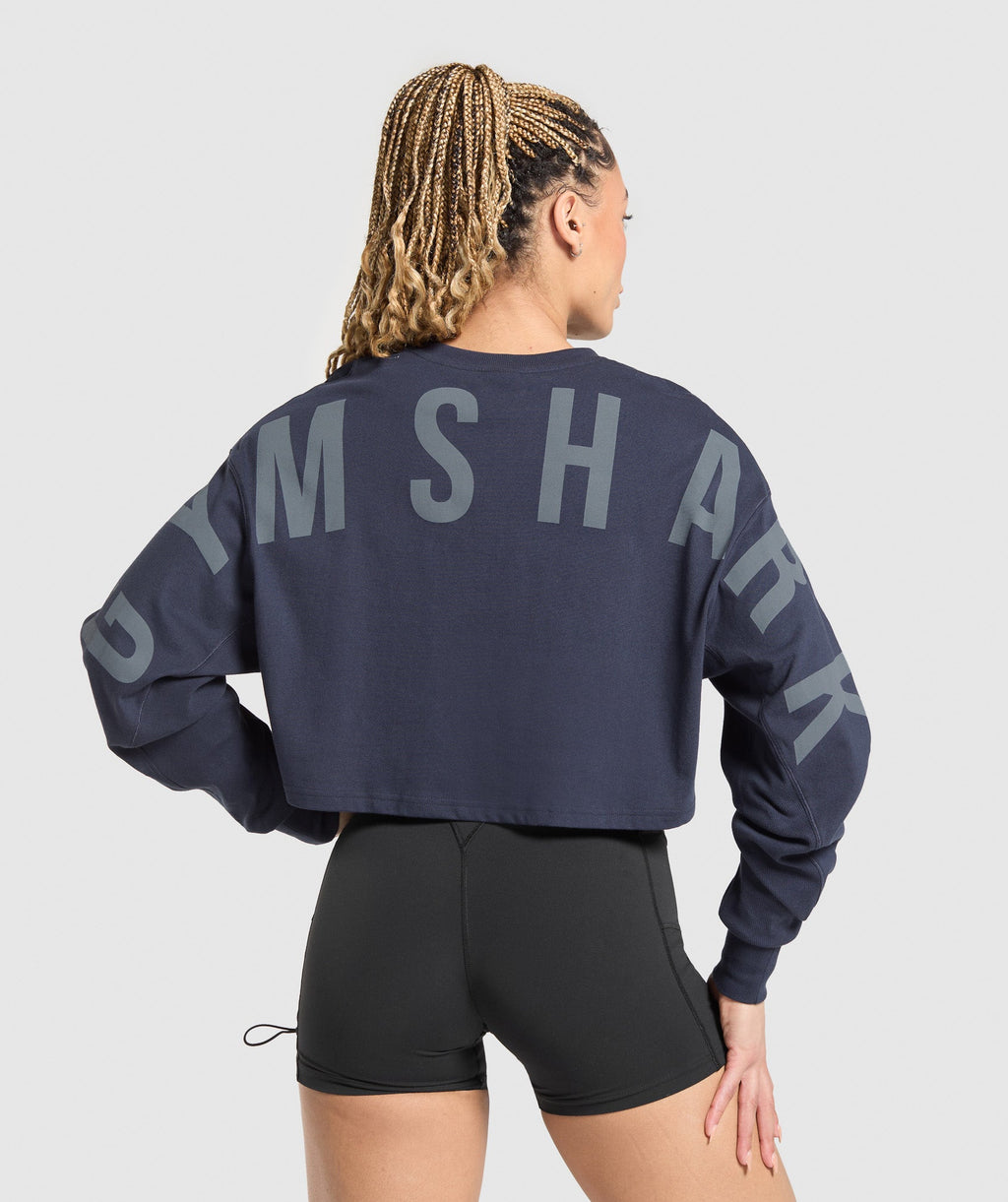 gymshark-gymshark-wordmark-graphic-long-sleeve-top-ls-tops-blue-ss25