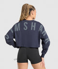 gymshark-gymshark-wordmark-graphic-long-sleeve-top-ls-tops-blue-ss25