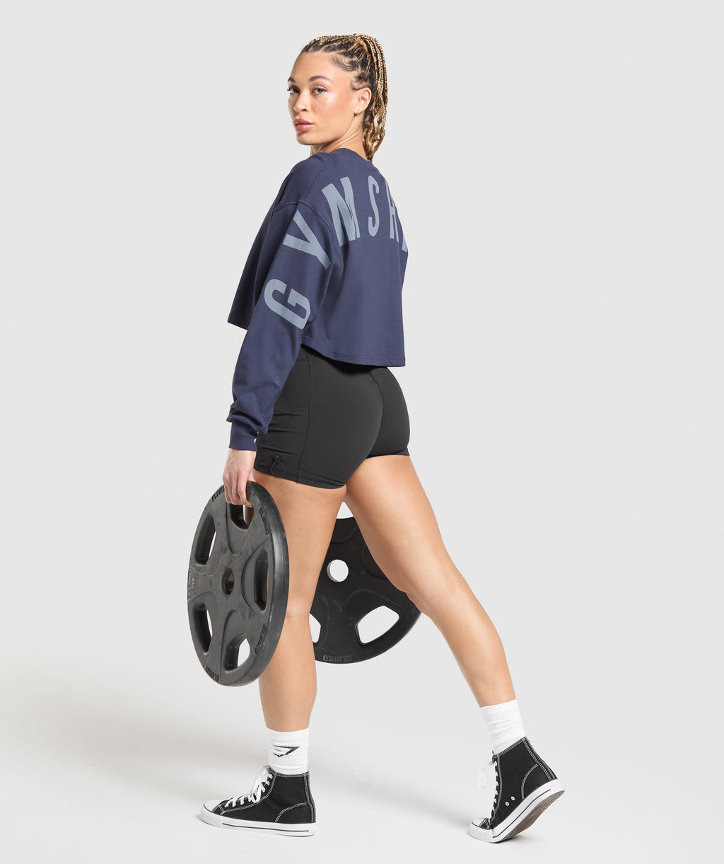 gymshark-gymshark-wordmark-graphic-long-sleeve-top-ls-tops-blue-ss25
