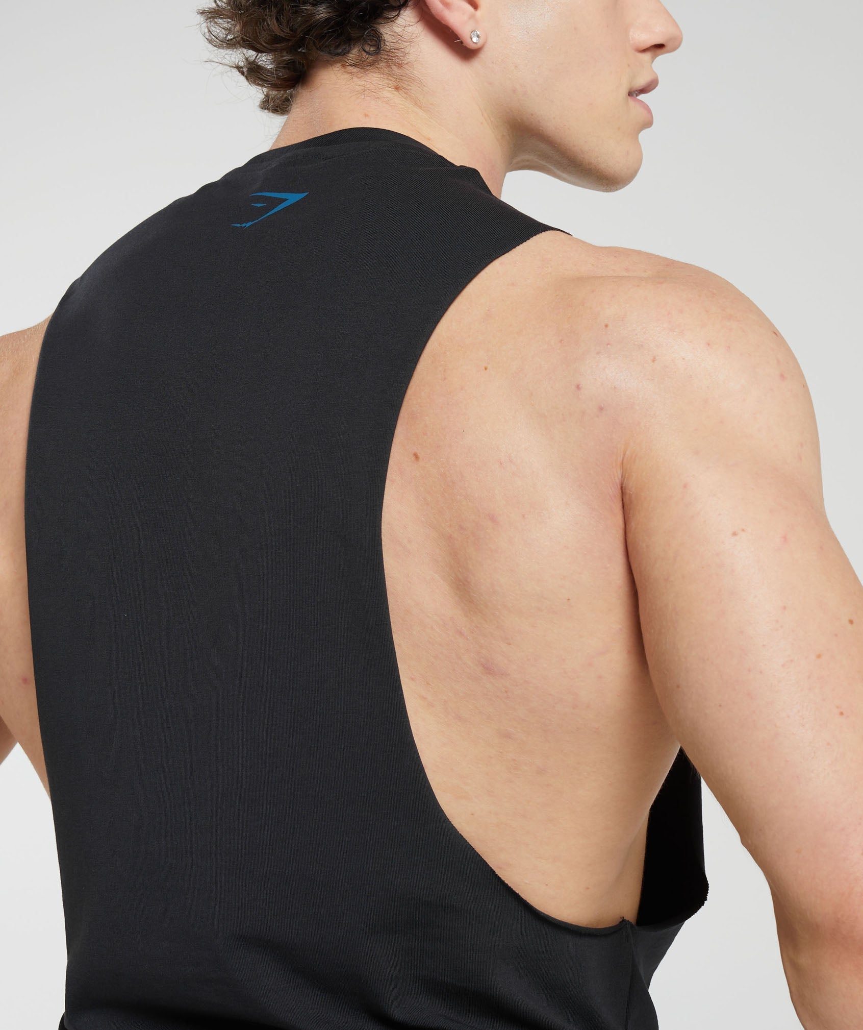 gymshark-heavy-metal-drop-arm-tank-black-aw23
