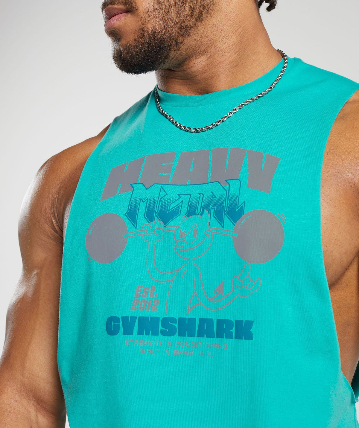 gymshark-heavy-metal-drop-arm-tank-blue-aw23