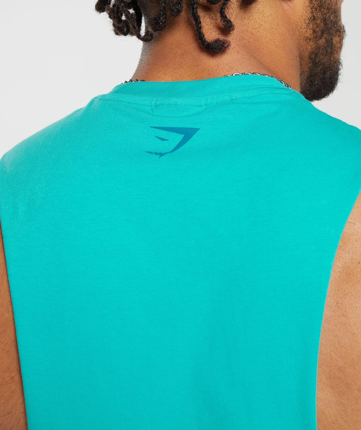 gymshark-heavy-metal-drop-arm-tank-blue-aw23