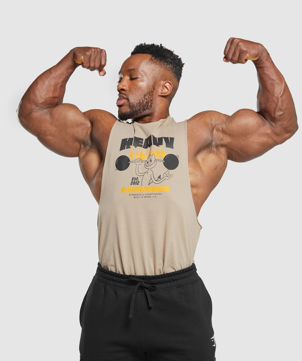 gymshark-heavy-metal-drop-arm-tank-brown-aw23