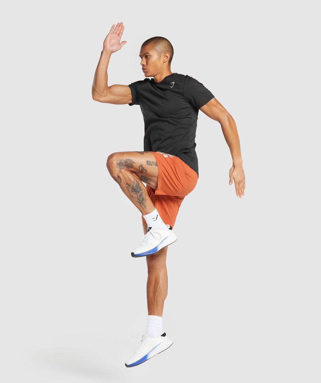 gymshark-hybrid-wellness-7-shorts-rust-orange-aw23