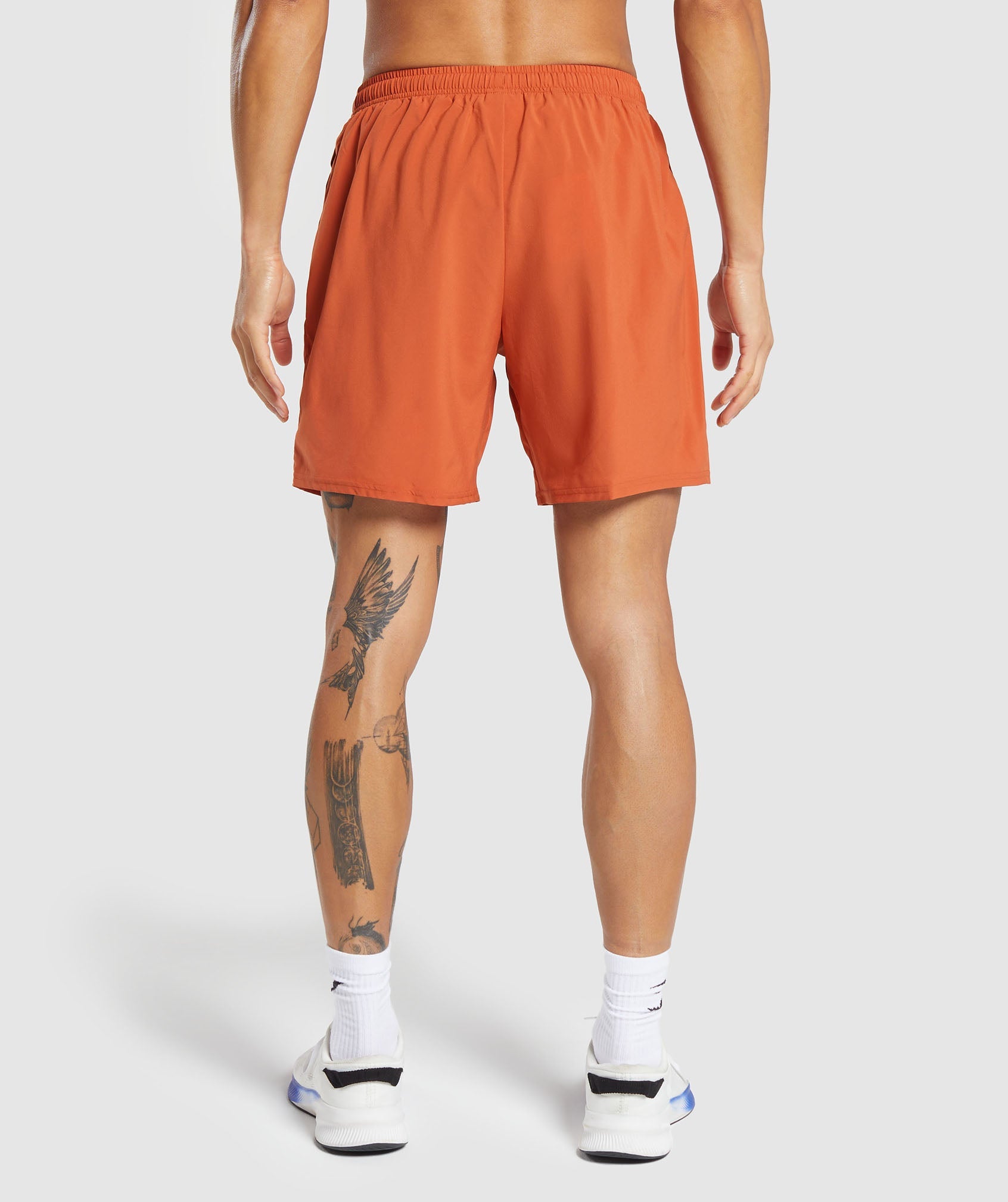 gymshark-hybrid-wellness-7-shorts-rust-orange-aw23