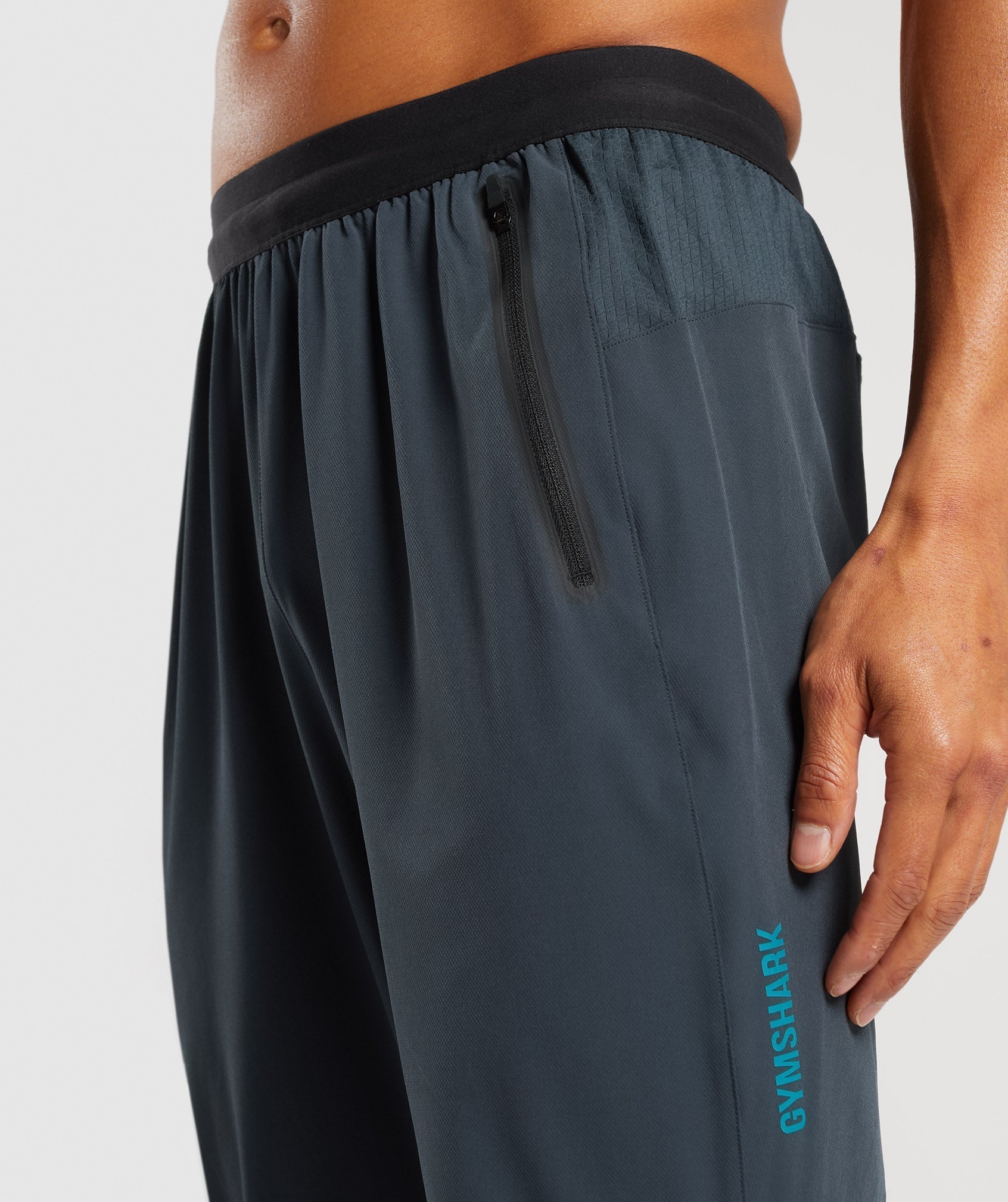 gymshark-hybrid-woven-joggers-darkest-teal-aw23