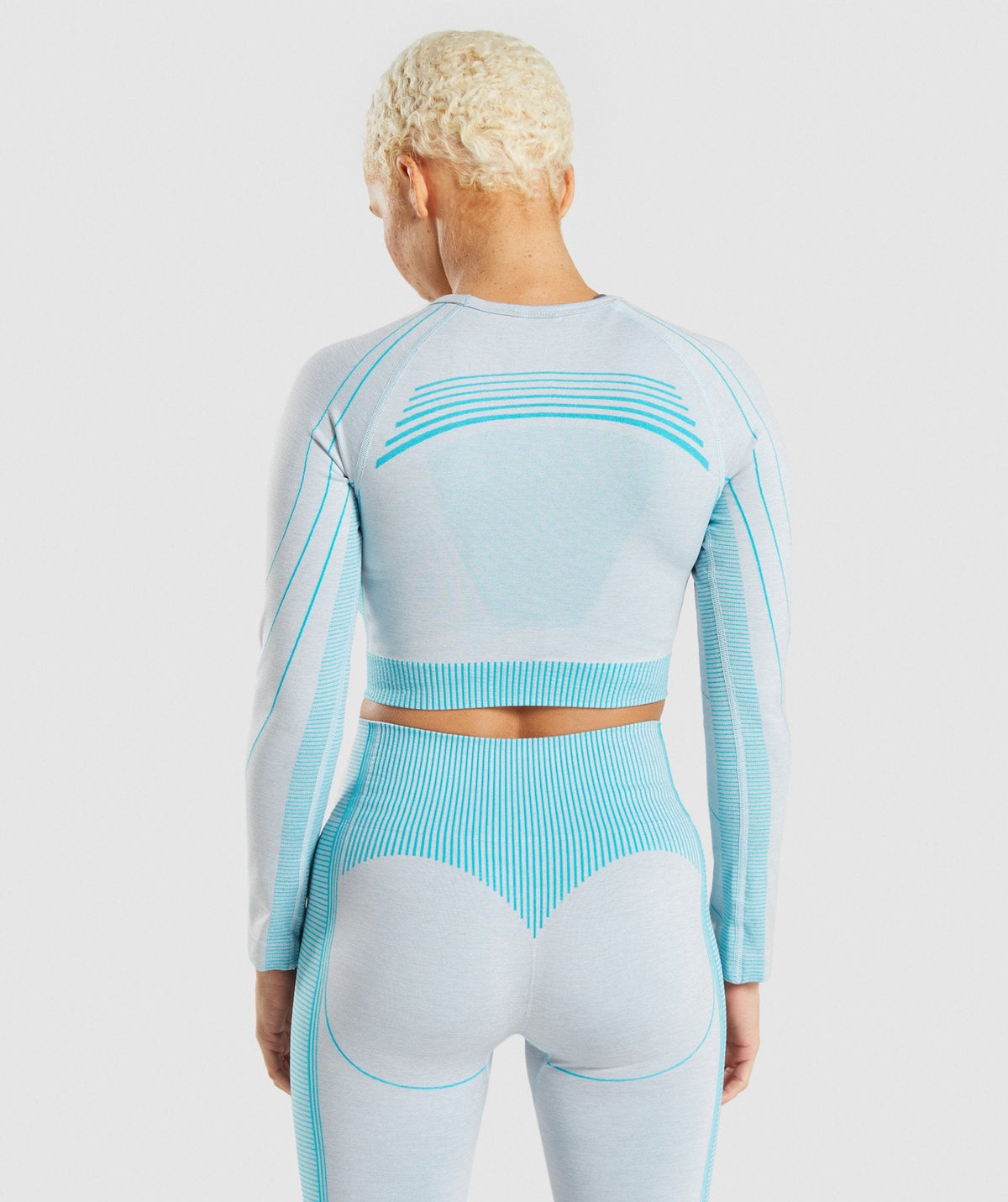 gymshark-hyper-amplify-long-sleeve-crop-top-light-grey-marl-light-teal