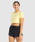 gymshark-italic-graphic-crop-top-yellow