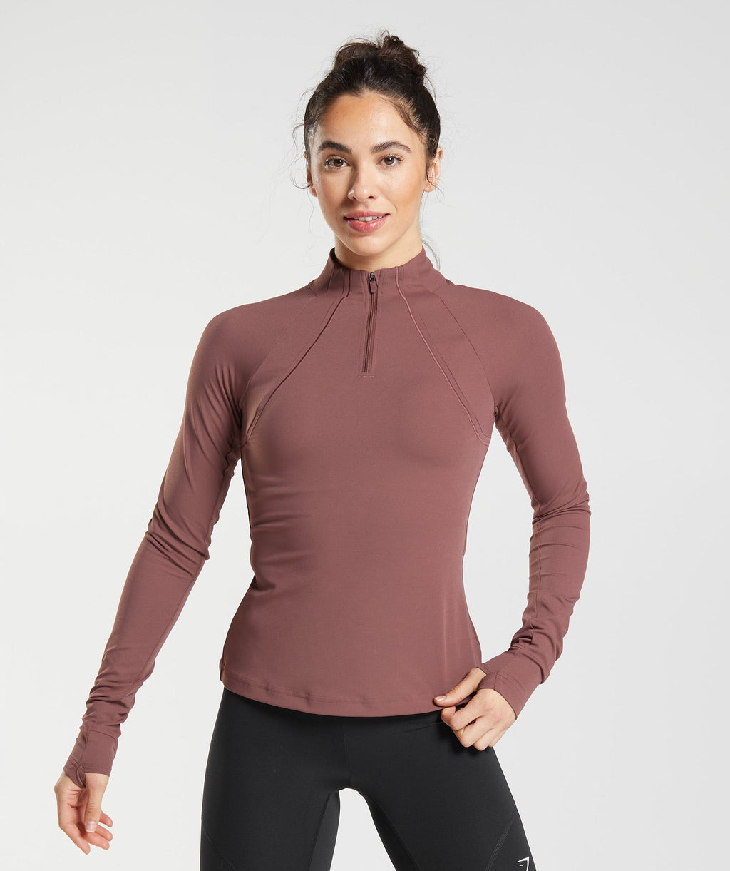 gymshark-running-1-4-zip-magenta-brown-ss23