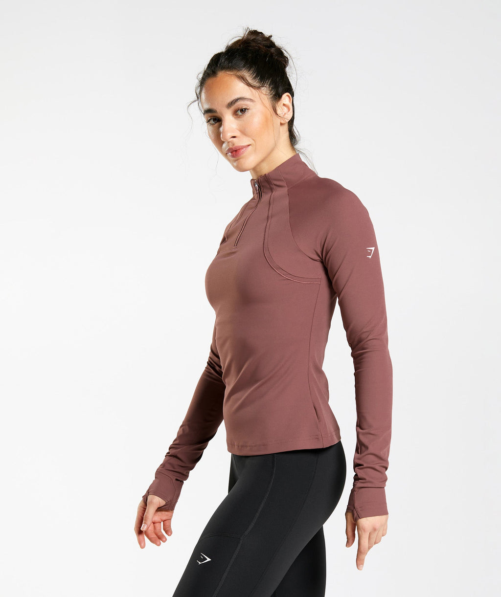 gymshark-running-1-4-zip-magenta-brown-ss23