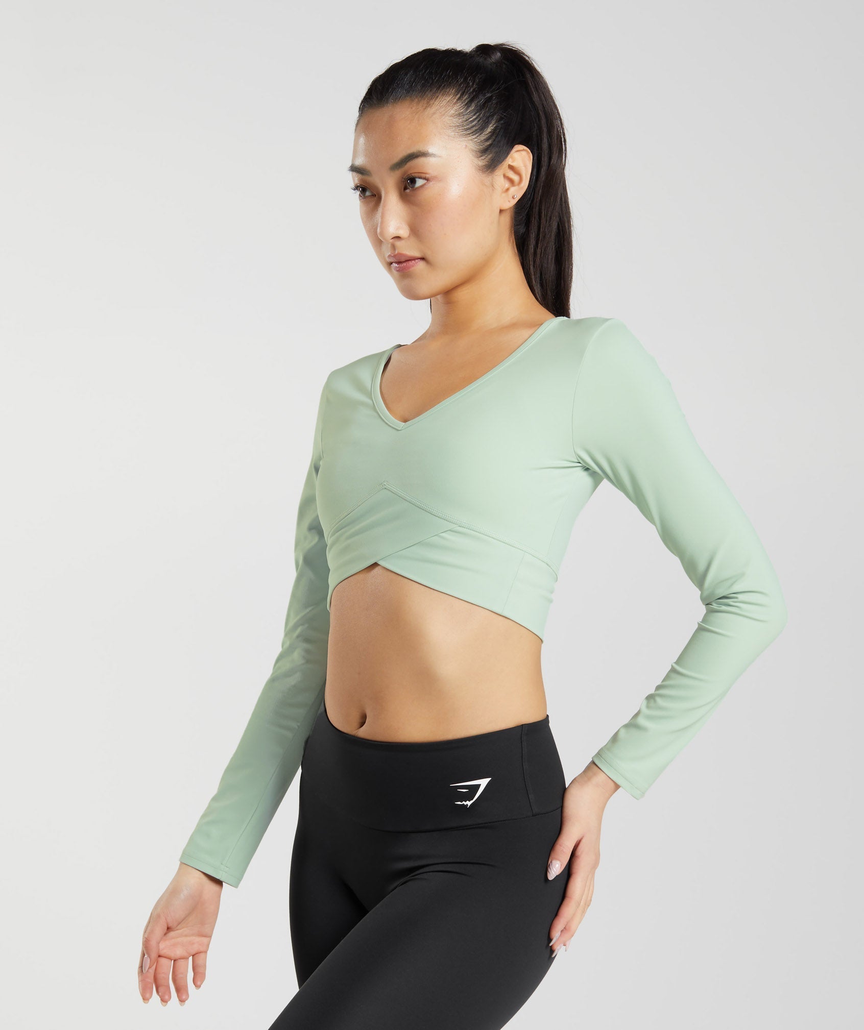 gymshark-crossover-long-sleeve-crop-top-mist-green-ss23