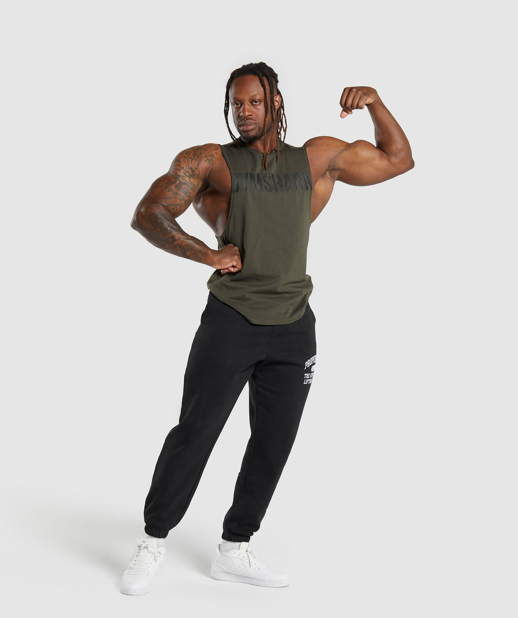 gymshark-impact-drop-arm-tank-strength-green-ss24
