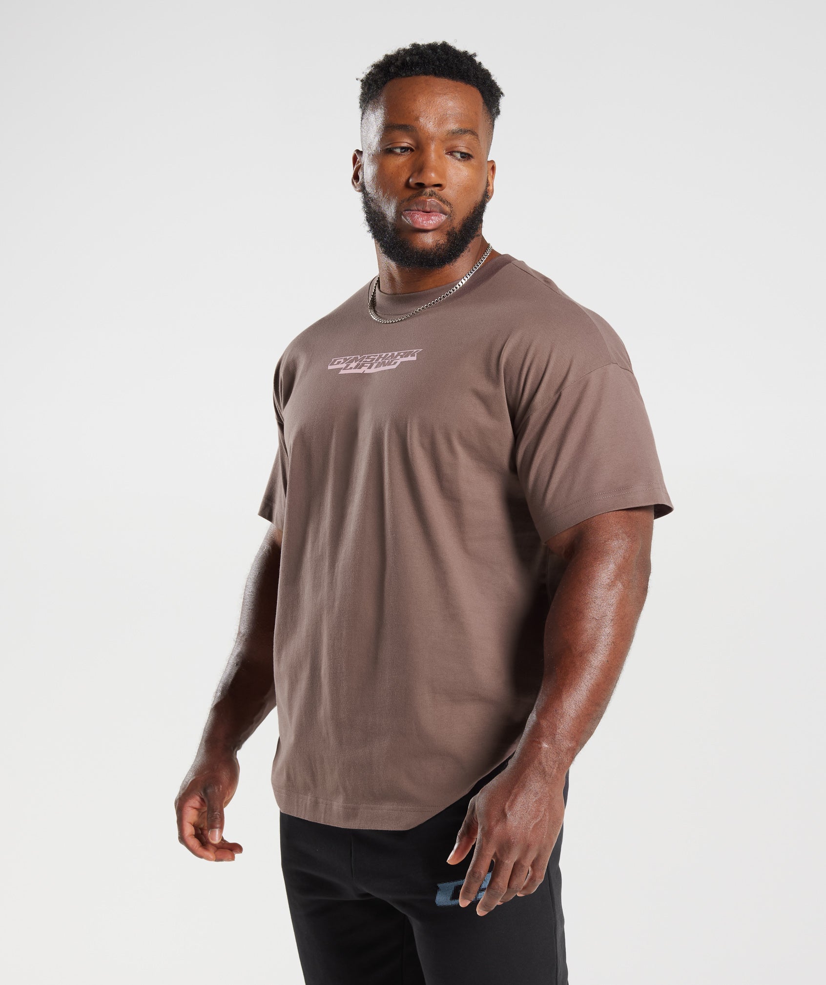gymshark-intergalactic-lifting-oversized-t-shirt-walnut-mauve-aw23