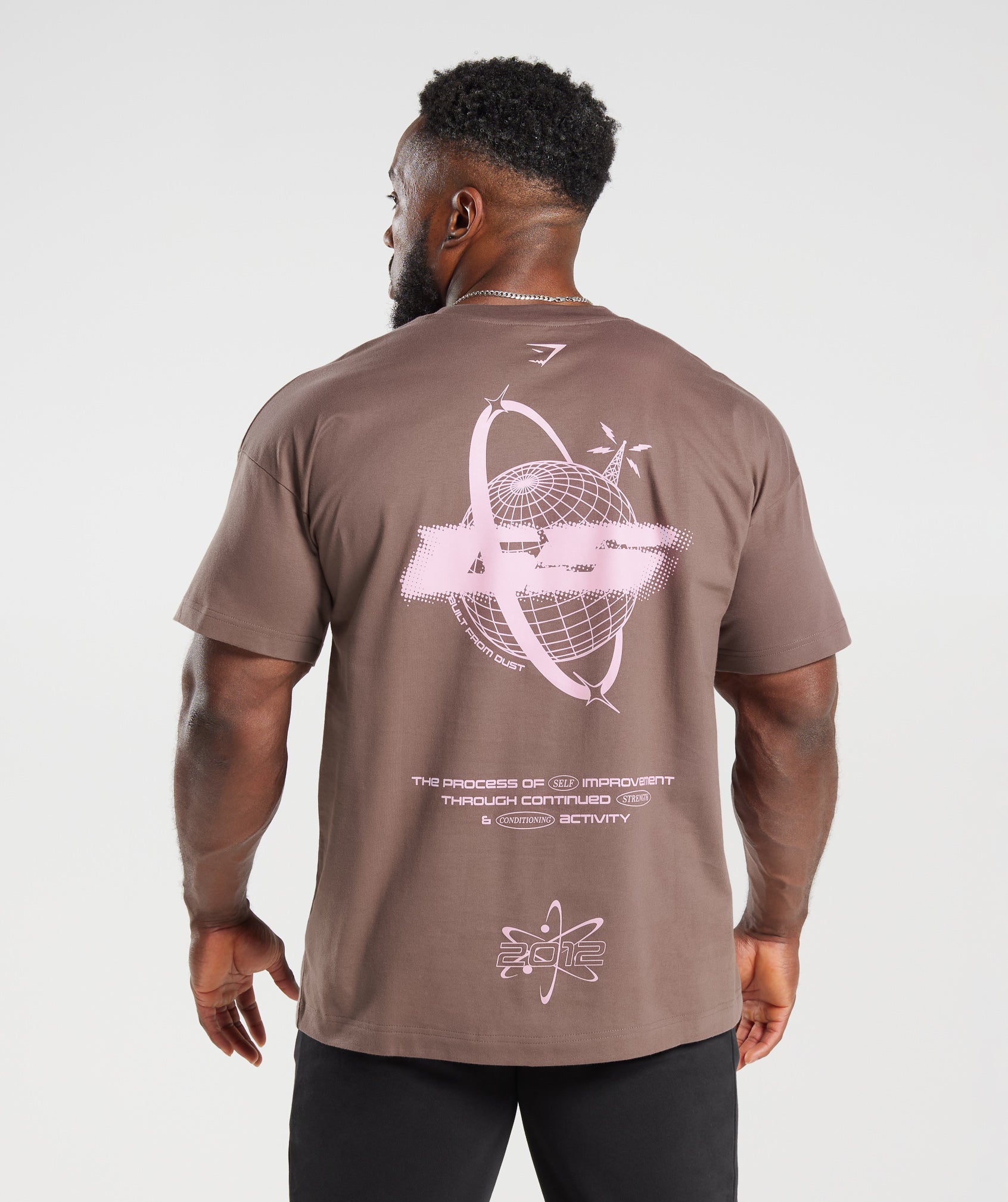 gymshark-intergalactic-lifting-oversized-t-shirt-walnut-mauve-aw23