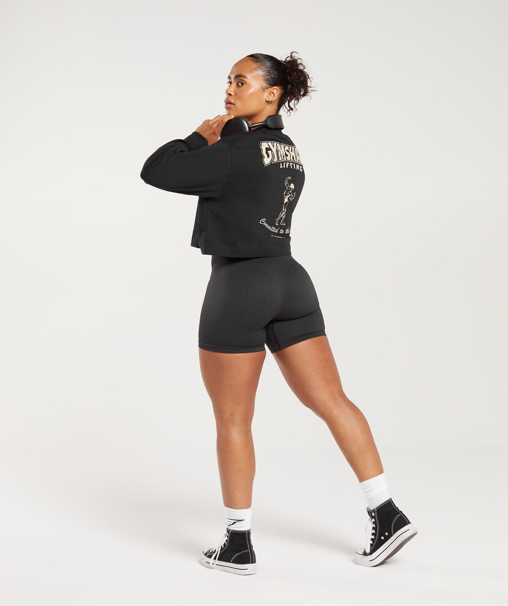 gymshark-committed-to-the-craft-oversized-long-sleeve-top-black-aw23