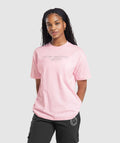 gymshark-its-giving-gym-oversized-t-shirt-dolly-pink-aw23