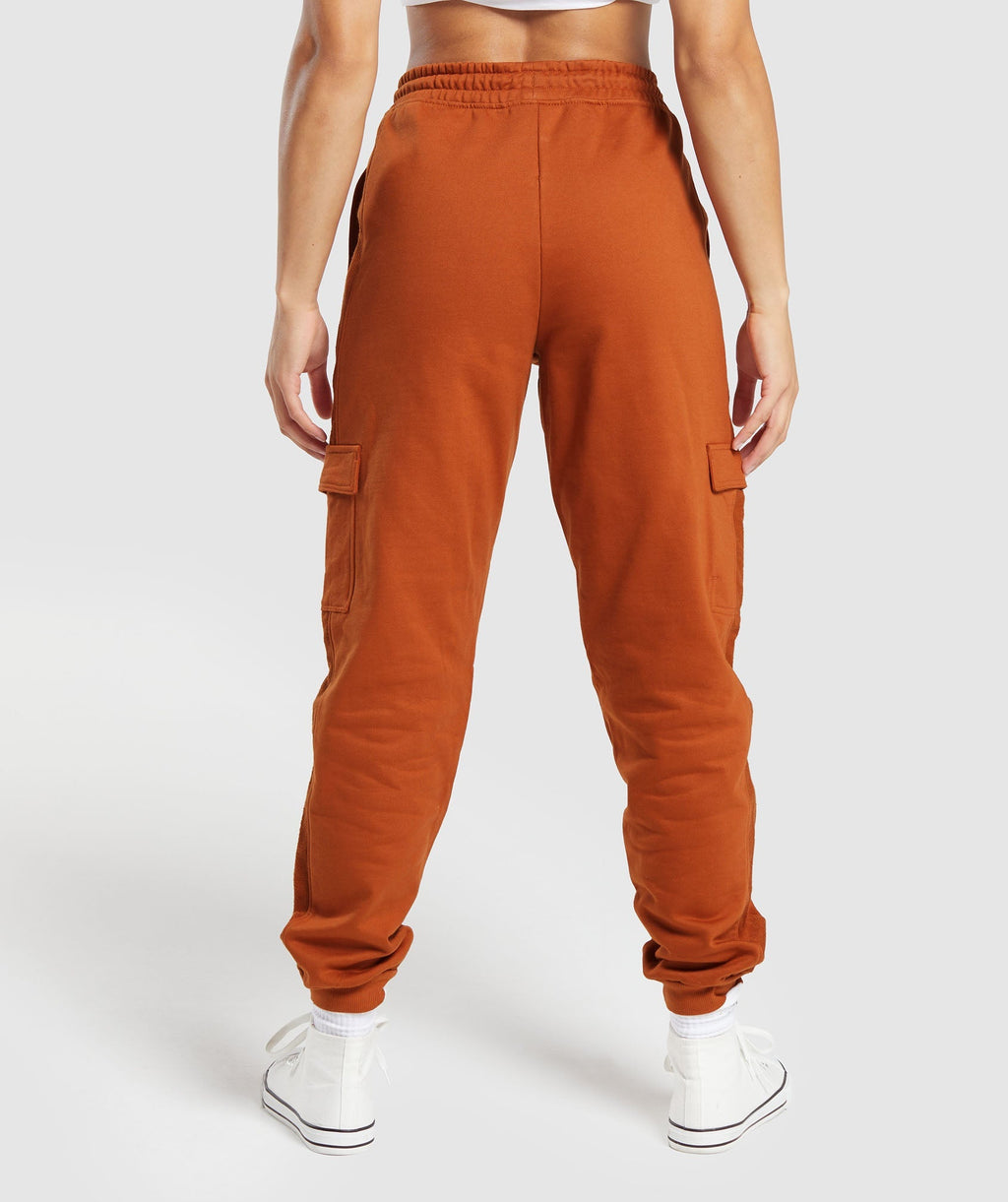 gymshark-legacy-joggers-nutmeg-orange-aw23