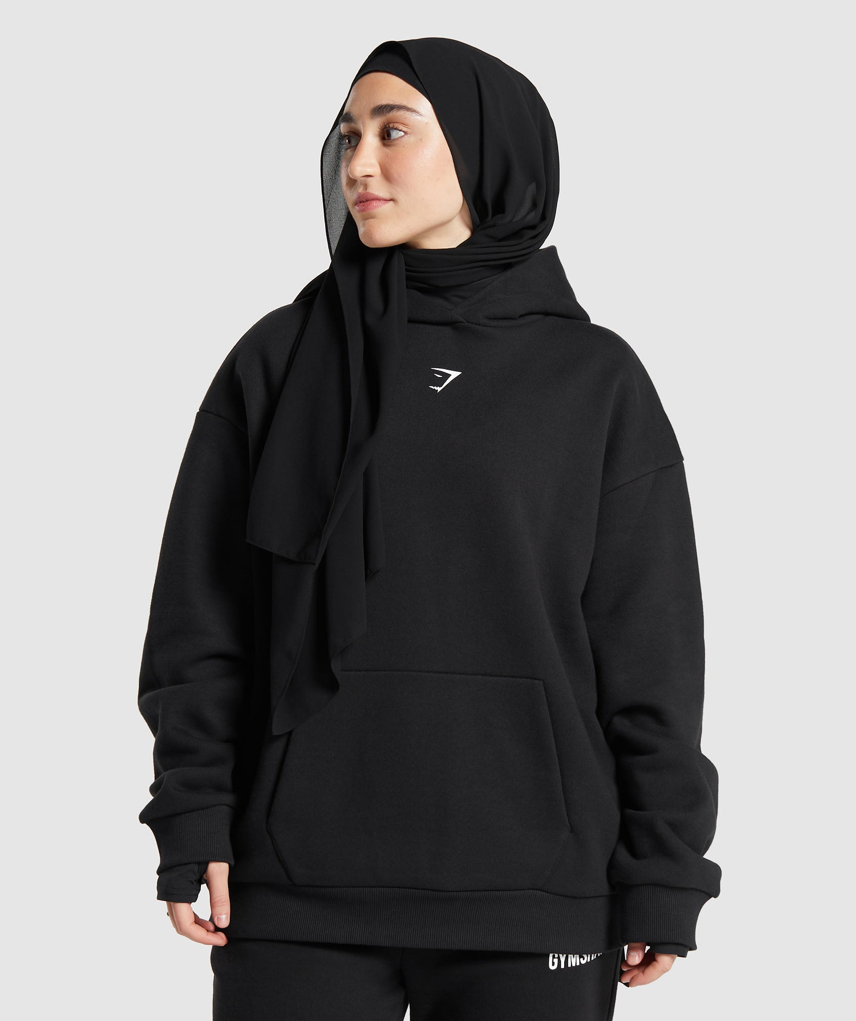 gs-x-leana-deeb-oversized-graphic-hoodie-black-ss24
