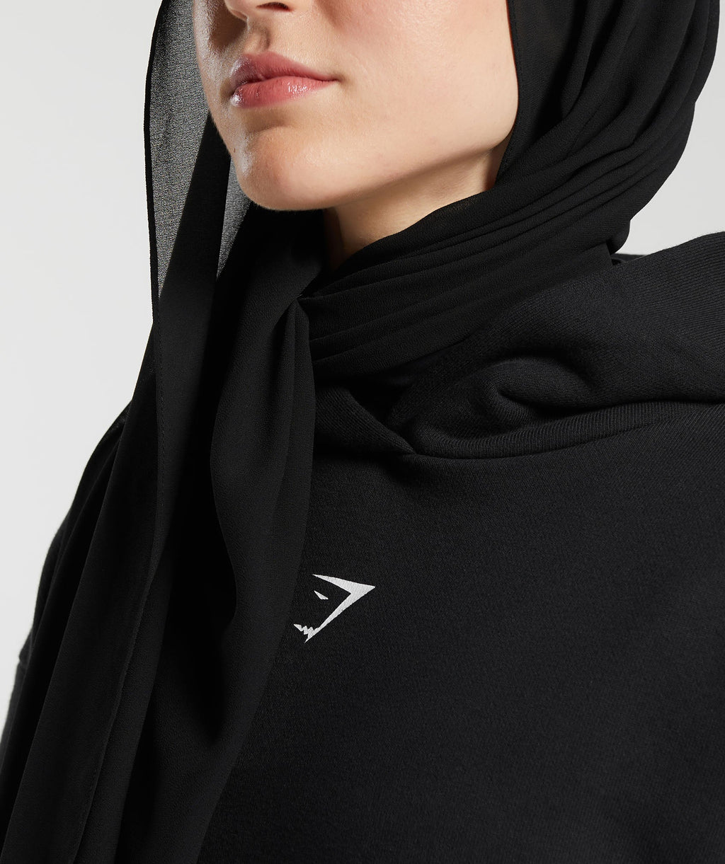 gs-x-leana-deeb-oversized-graphic-hoodie-black-ss24