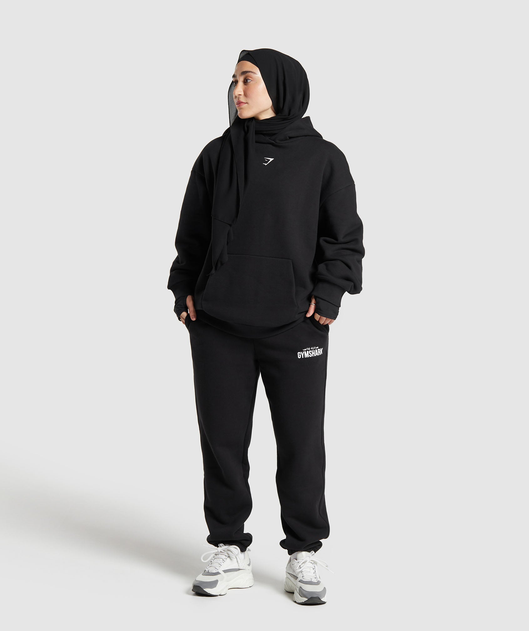 gs-x-leana-deeb-oversized-graphic-hoodie-black-ss24