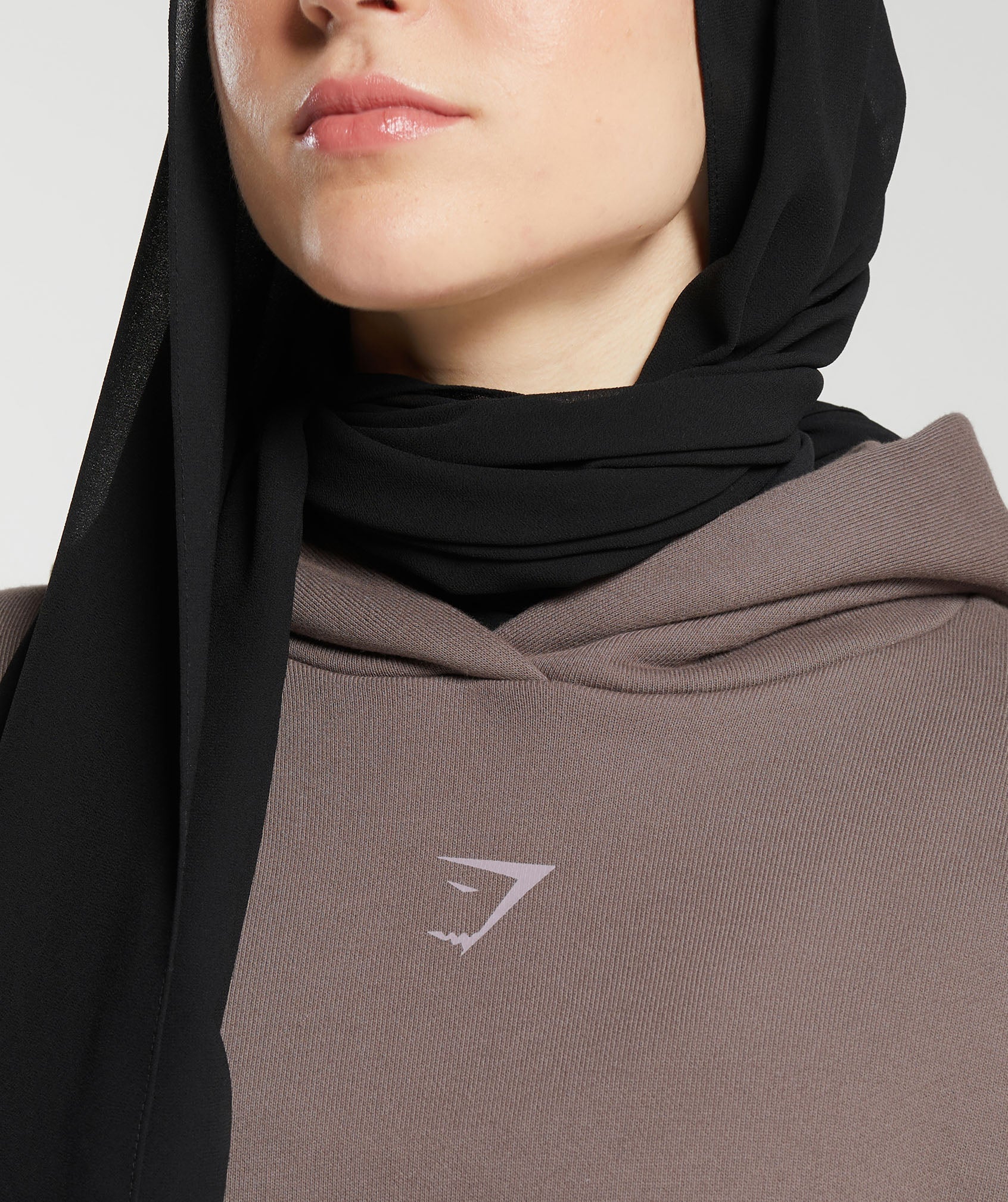 gs-x-leana-deeb-oversized-graphic-hoodie-dusty-brown-ss24
