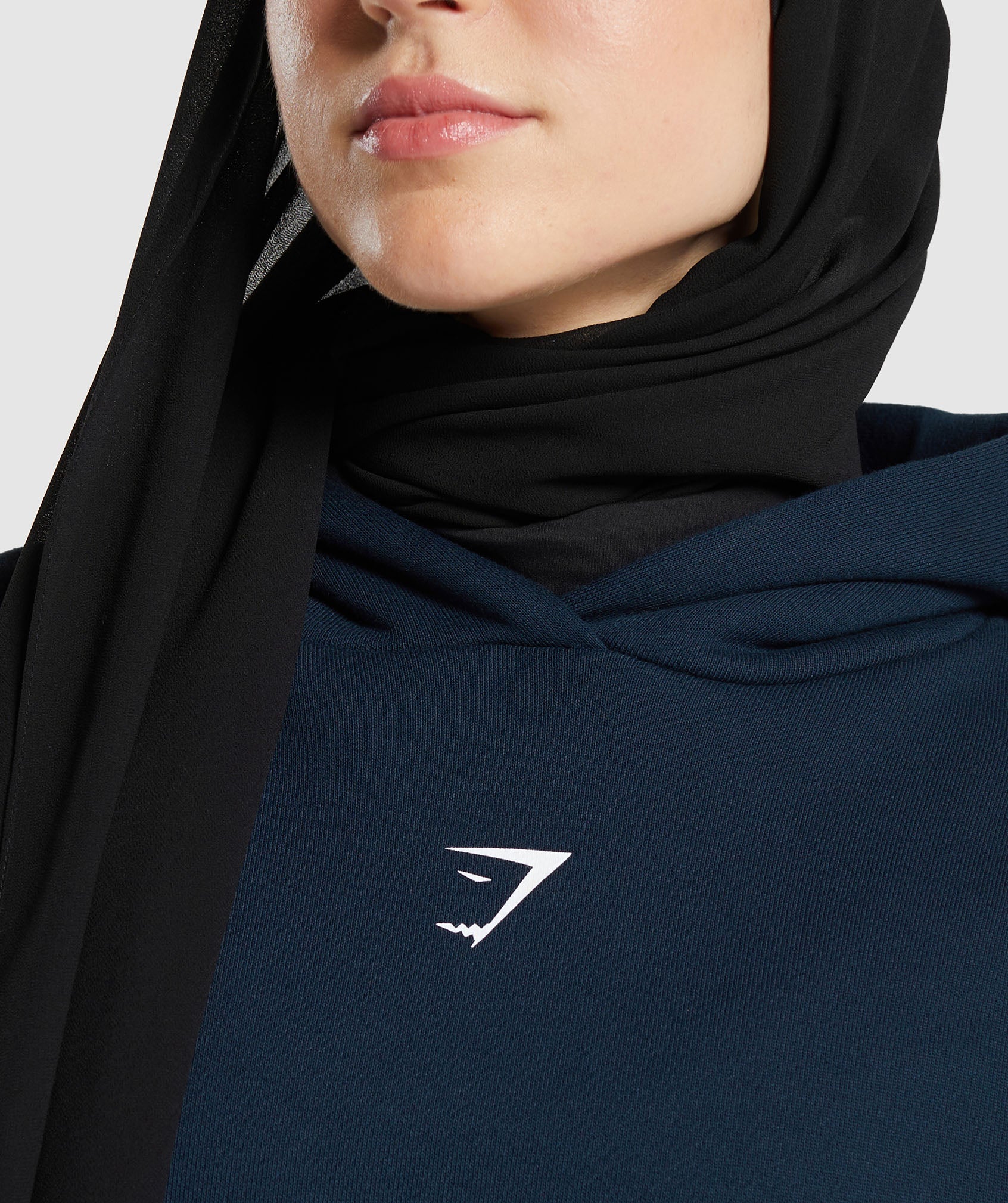 gs-x-leana-deeb-oversized-graphic-hoodie-navy-ss24