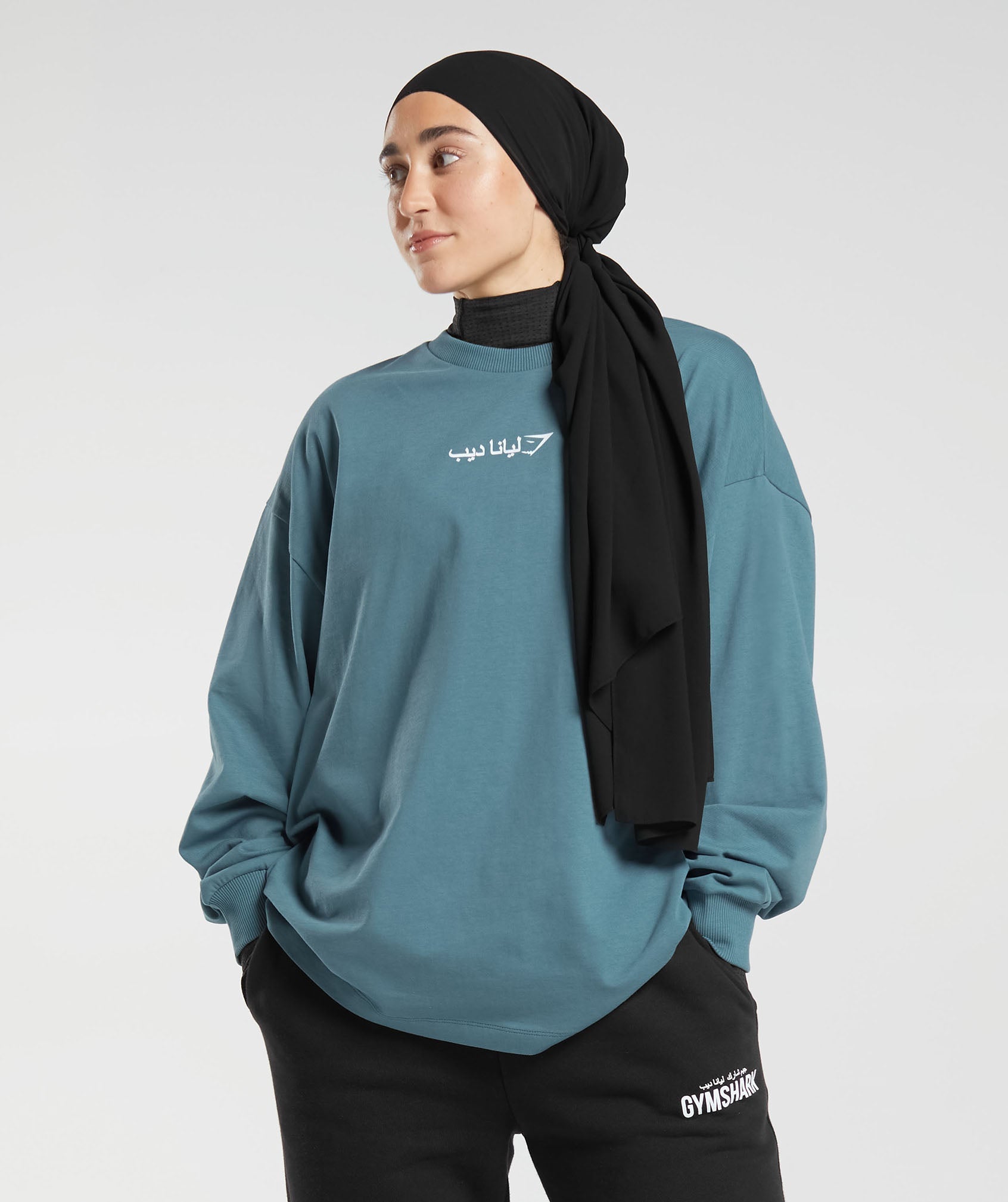 gs-x-leana-deeb-oversized-oversized-long-sleeve-top-mood-blue-aw23