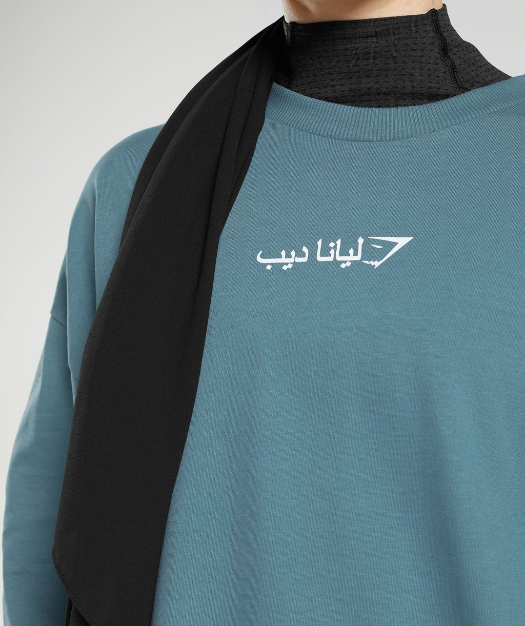gs-x-leana-deeb-oversized-oversized-long-sleeve-top-mood-blue-aw23