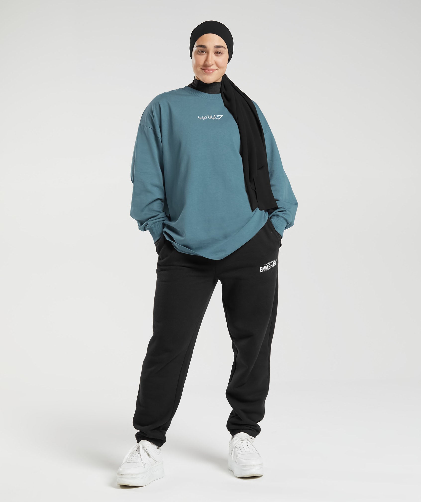 gs-x-leana-deeb-oversized-oversized-long-sleeve-top-mood-blue-aw23