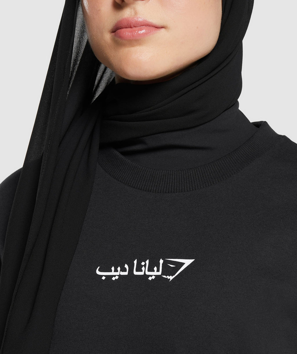 gs-x-leana-deeb-oversized-long-sleeve-top-black-ss24