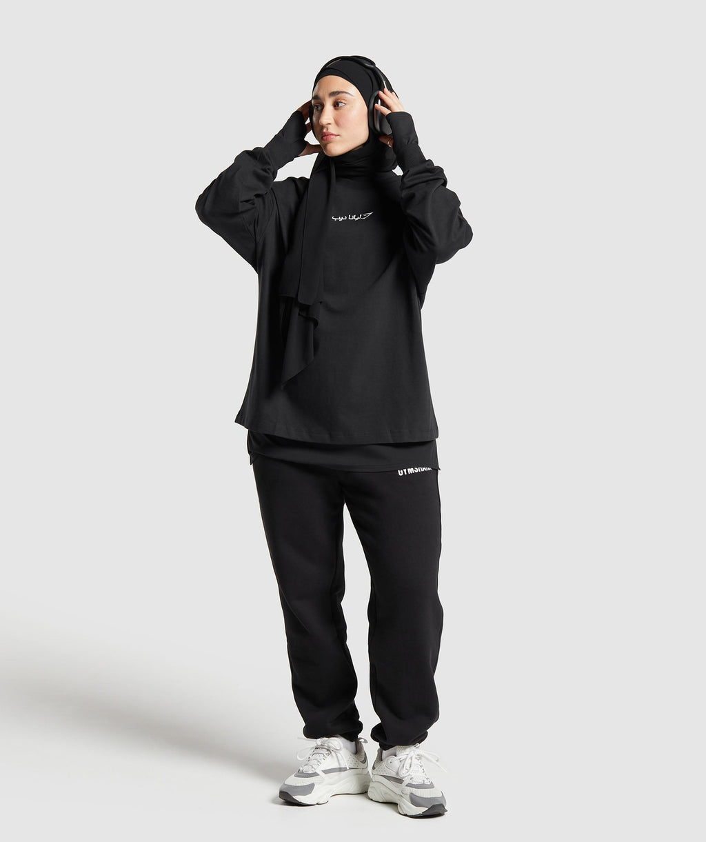 gs-x-leana-deeb-oversized-long-sleeve-top-black-ss24