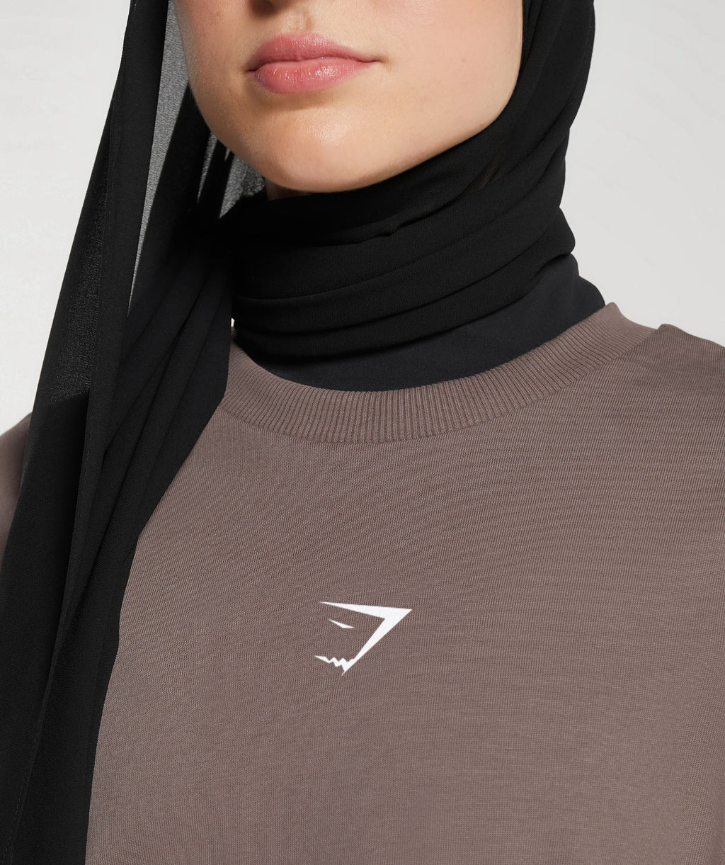 gs-x-leana-deeb-graphic-oversized-long-sleeve-top-dusty-brown-ss24