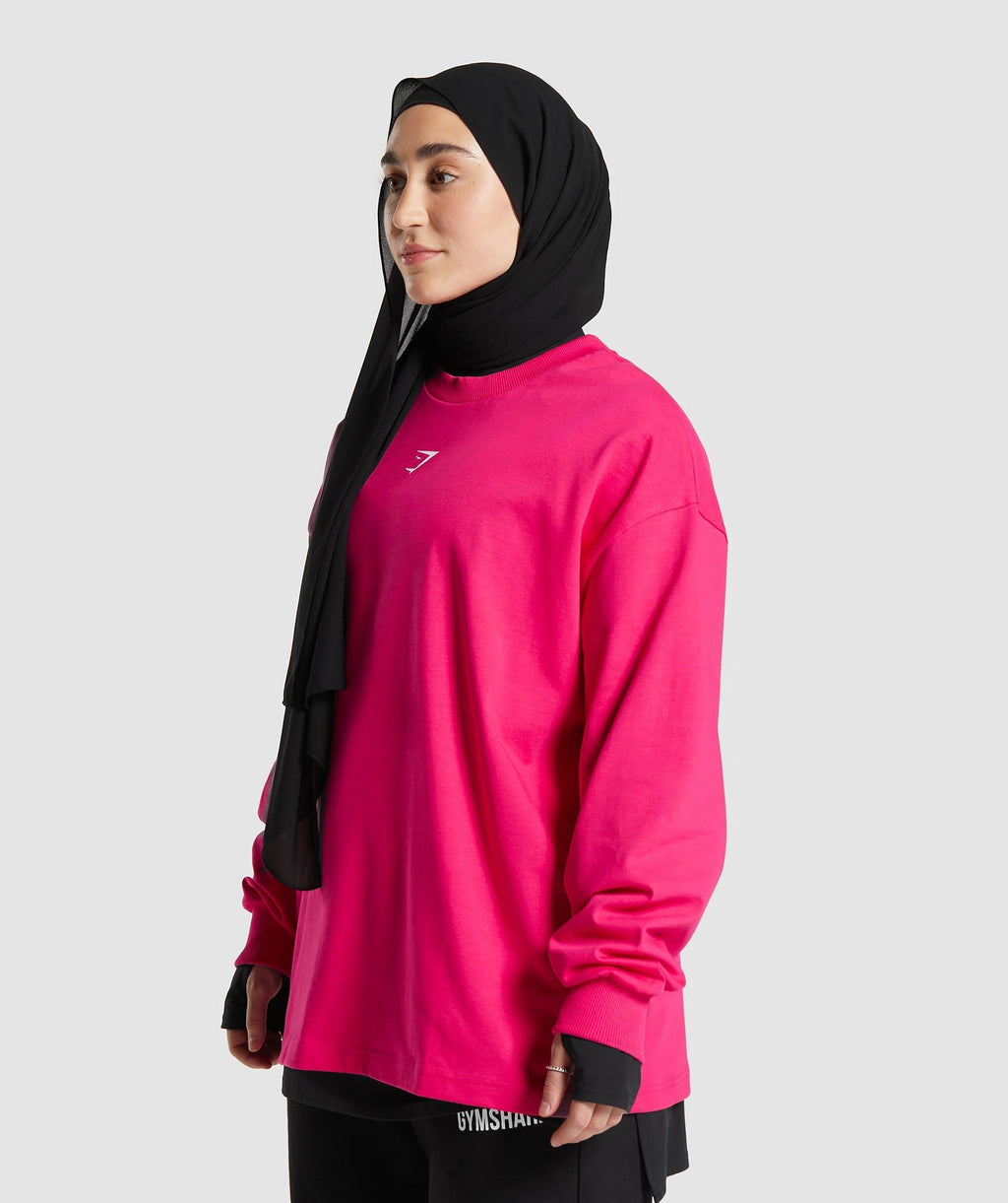 gs-x-leana-deeb-graphic-oversized-long-sleeve-top-impact-pink-ss24