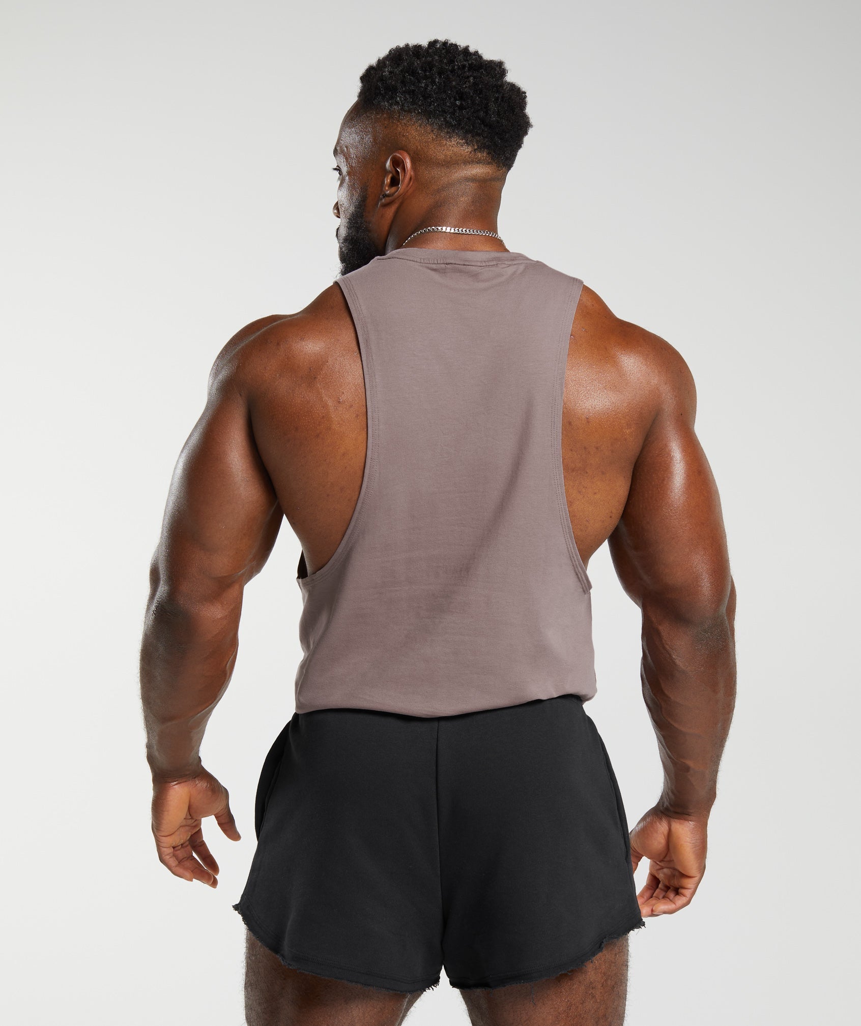 gymshark-legacy-drop-arm-tank-washed-mauve-aw23