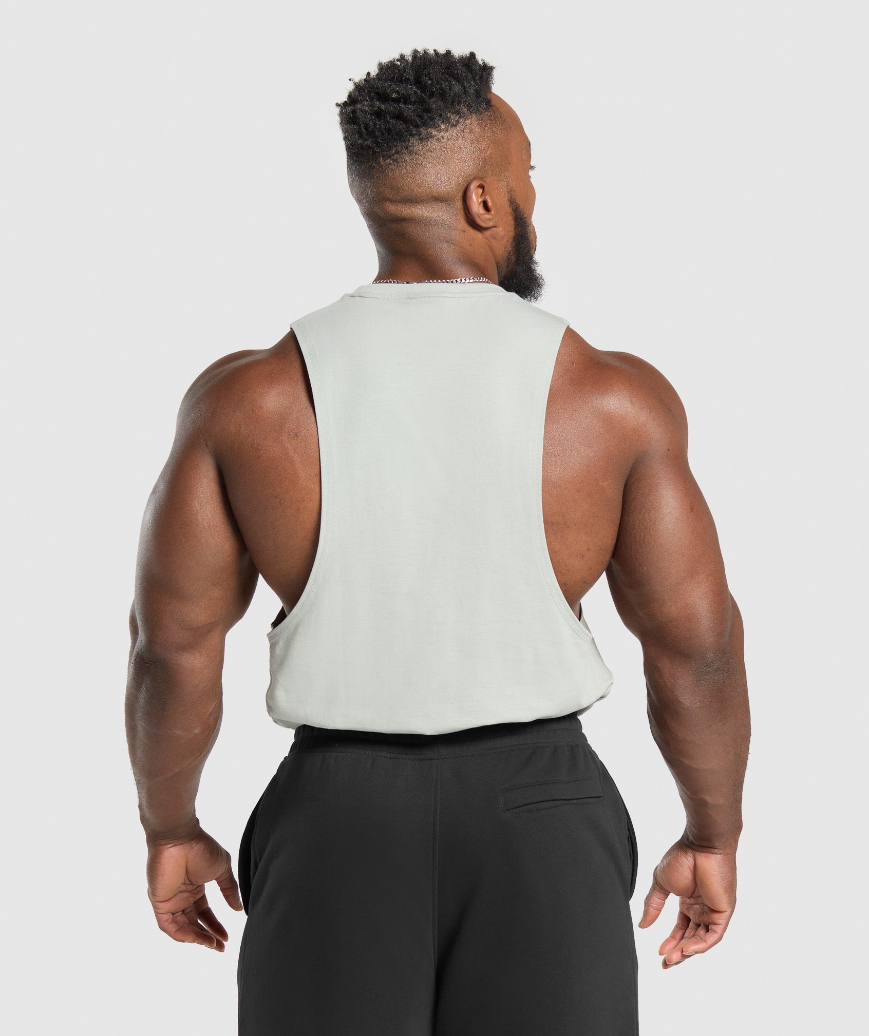 gymshark-legacy-drop-arm-tank-stone-grey-ss25