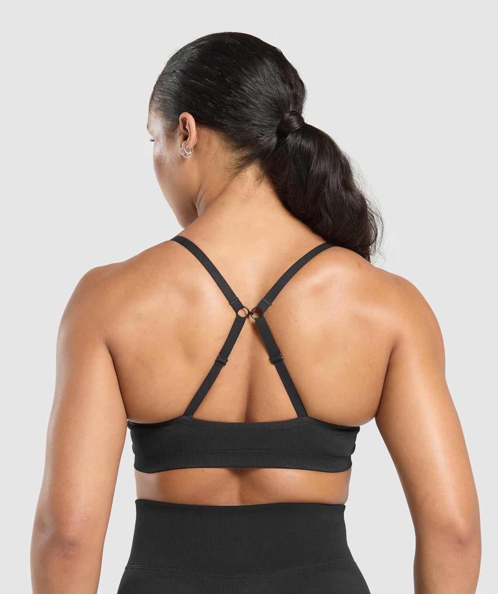 gymshark-lift-seamless-sports-bra-black-black-marl-ss25