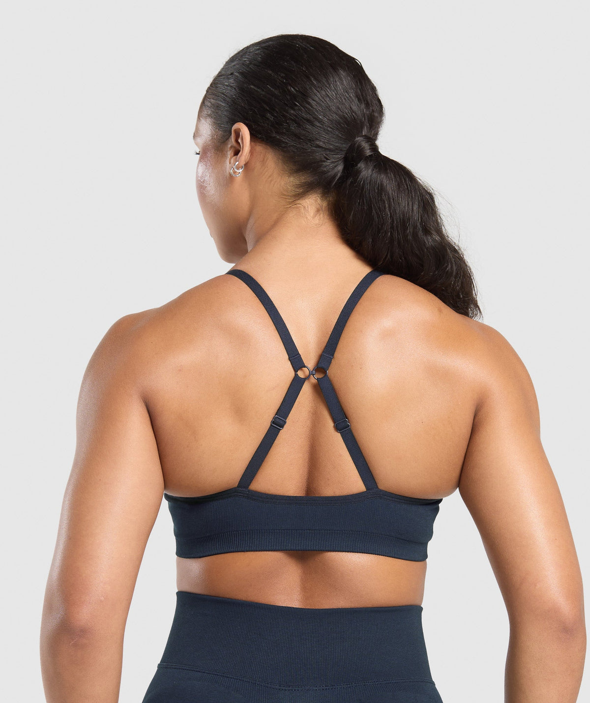 gymshark-lift-seamless-sports-bra-midnight-blue-black-marl-ss25
