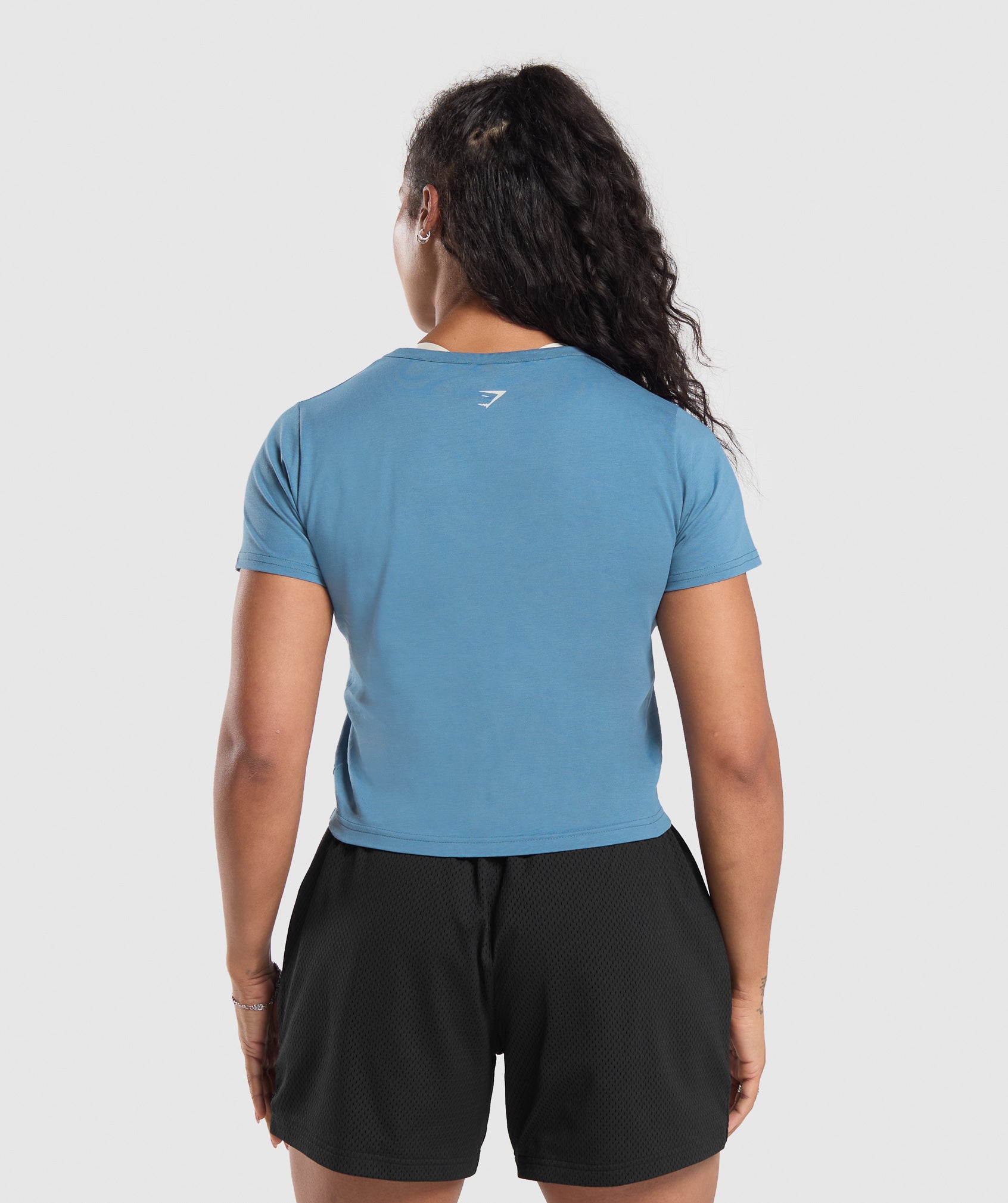 gymshark-lifting-club-graphic-baby-tee-faded-blue-aw24