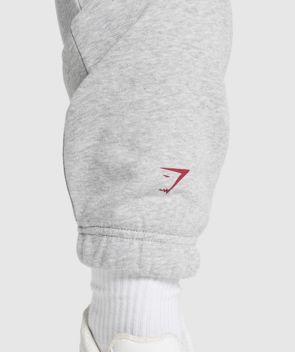 gymshark-lifting-essentials-graphic-brushed-oversized-joggers-light-grey-core-marl-ss25