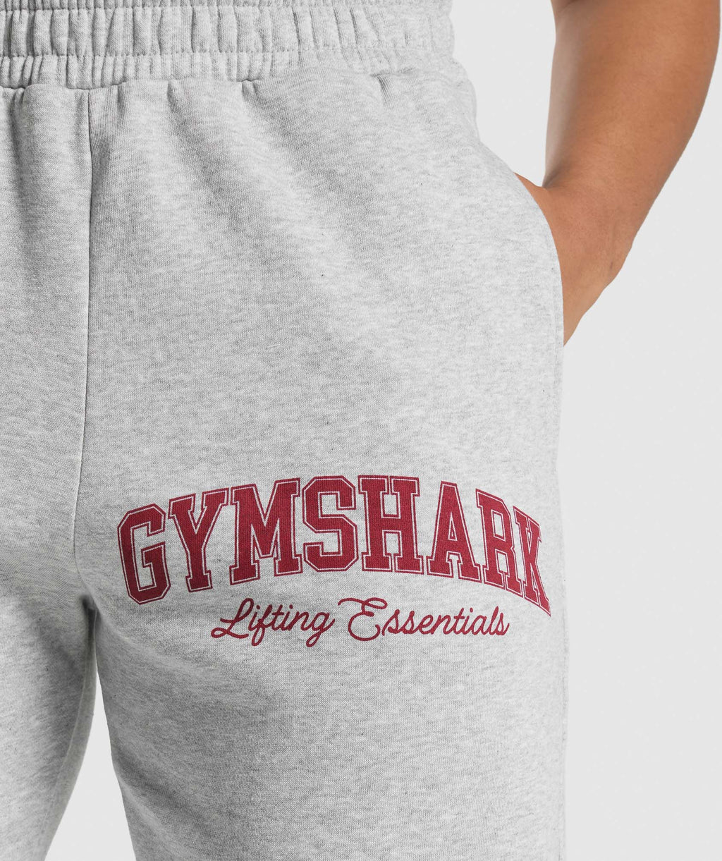 gymshark-lifting-essentials-graphic-brushed-oversized-joggers-light-grey-core-marl-ss25