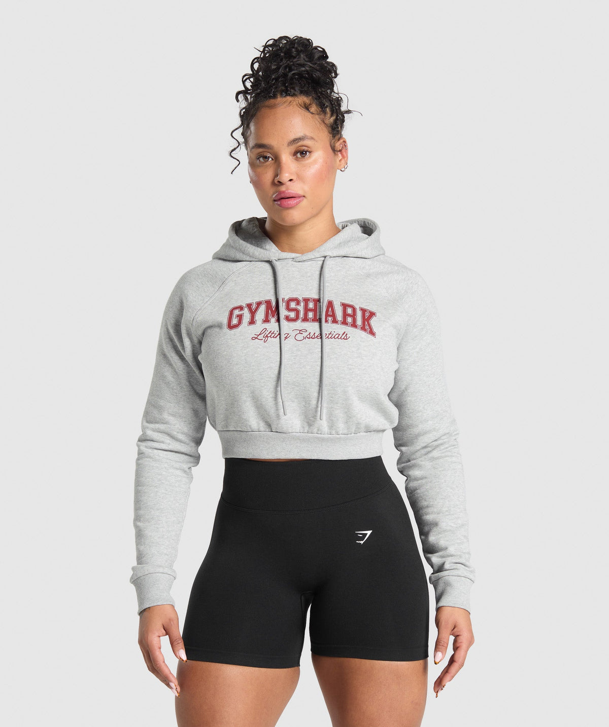 gymshark-lifting-essentials-graphic-cropped-hoodie-light-grey-core-marl-ss25