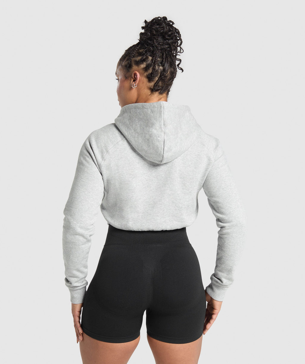 gymshark-lifting-essentials-graphic-cropped-hoodie-light-grey-core-marl-ss25