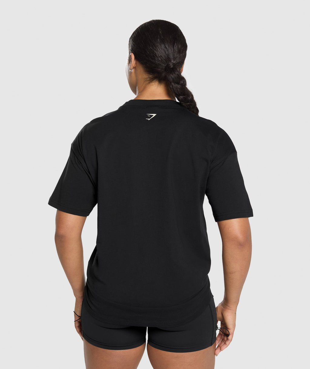 gymshark-lifting-essentials-graphic-oversized-t-shirt-black-ss25