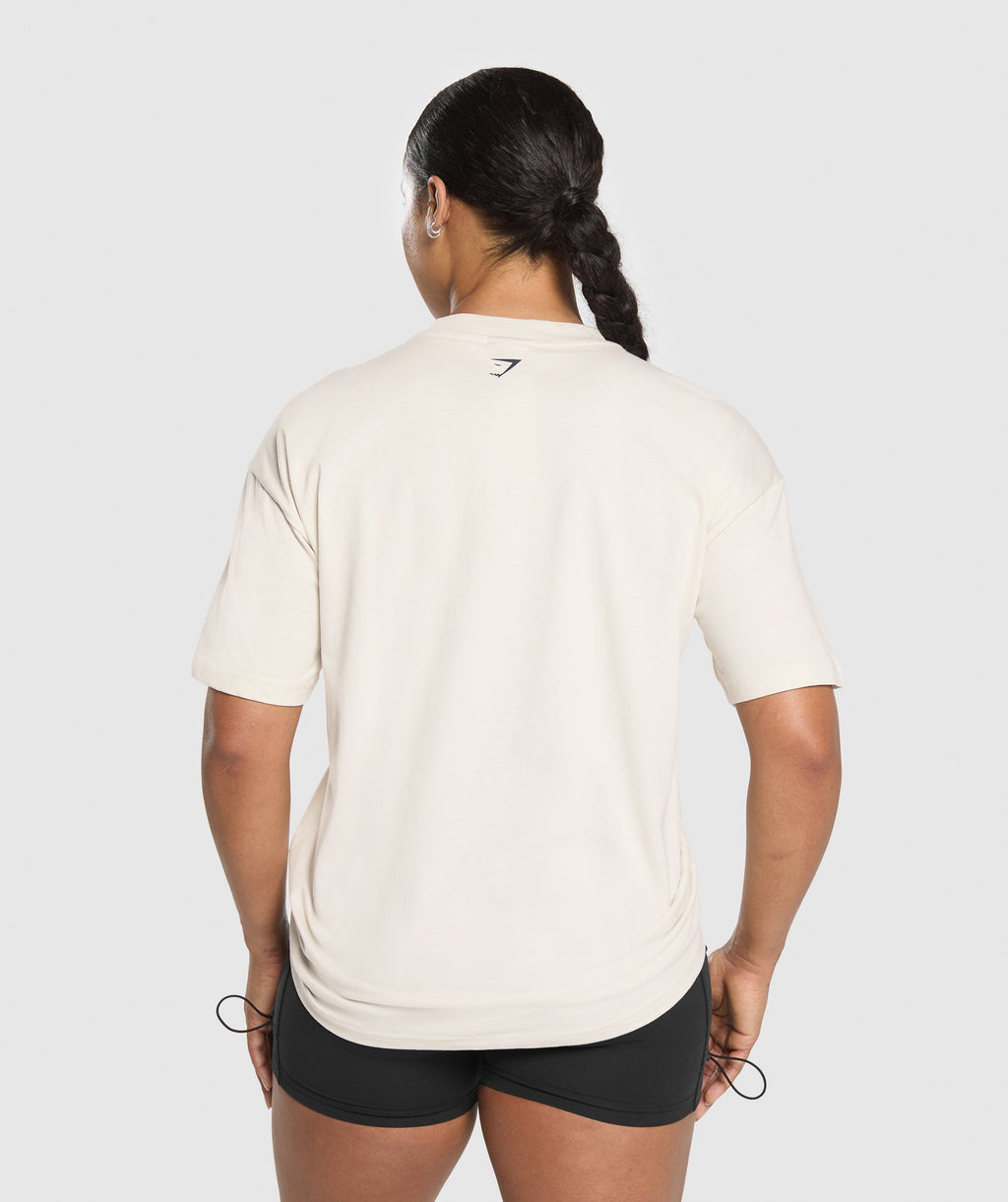 gymshark-lifting-essentials-graphic-oversized-t-shirt-ss-tops-white-ss25