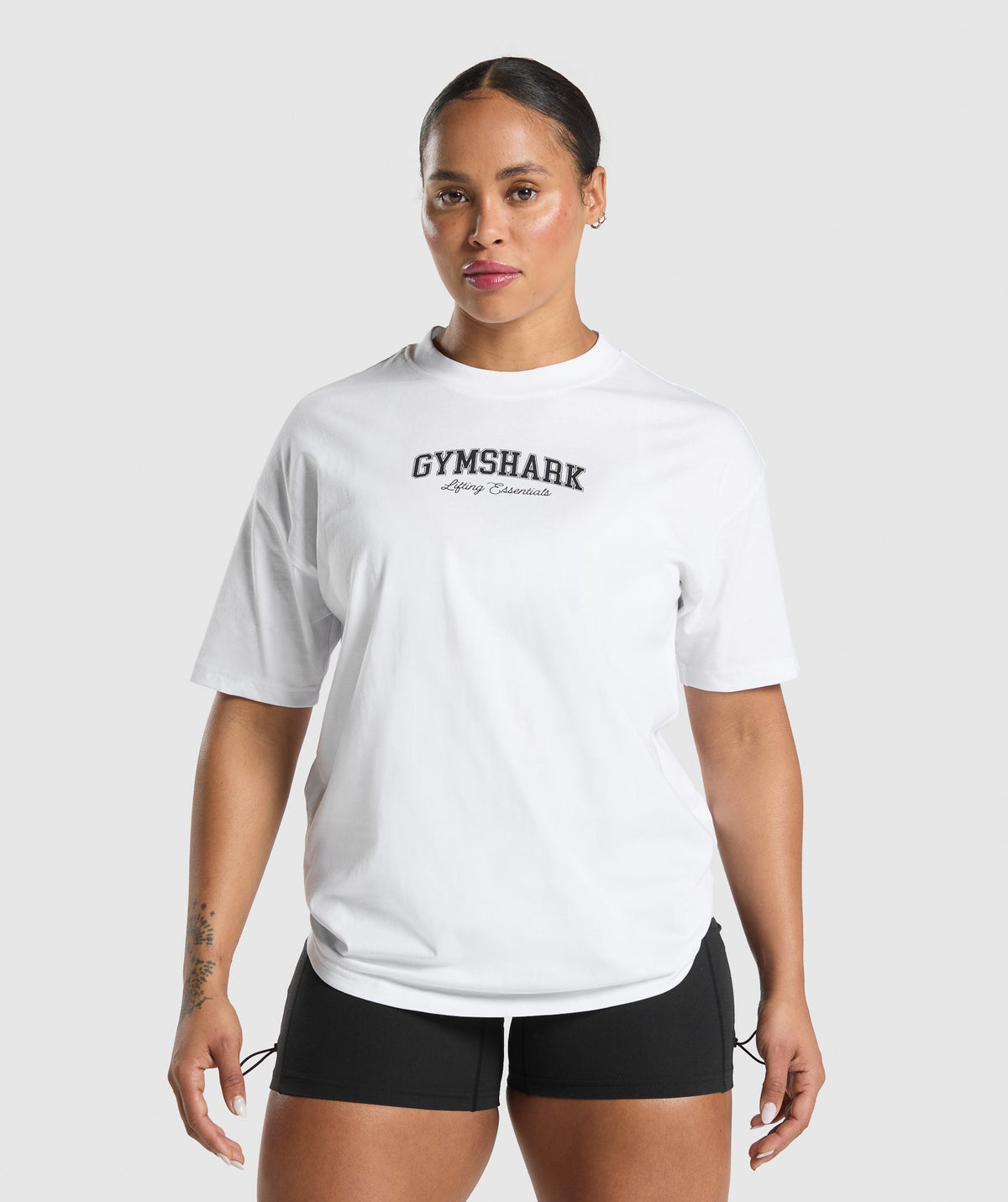 gymshark-lifting-essentials-graphic-oversized-t-shirt-white-ss25