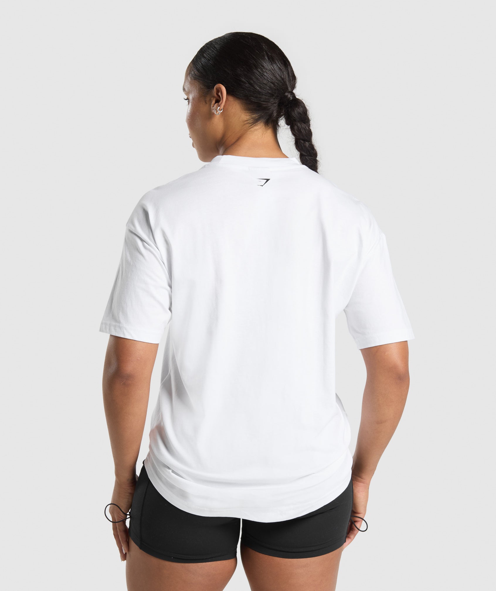 gymshark-lifting-essentials-graphic-oversized-t-shirt-white-ss25
