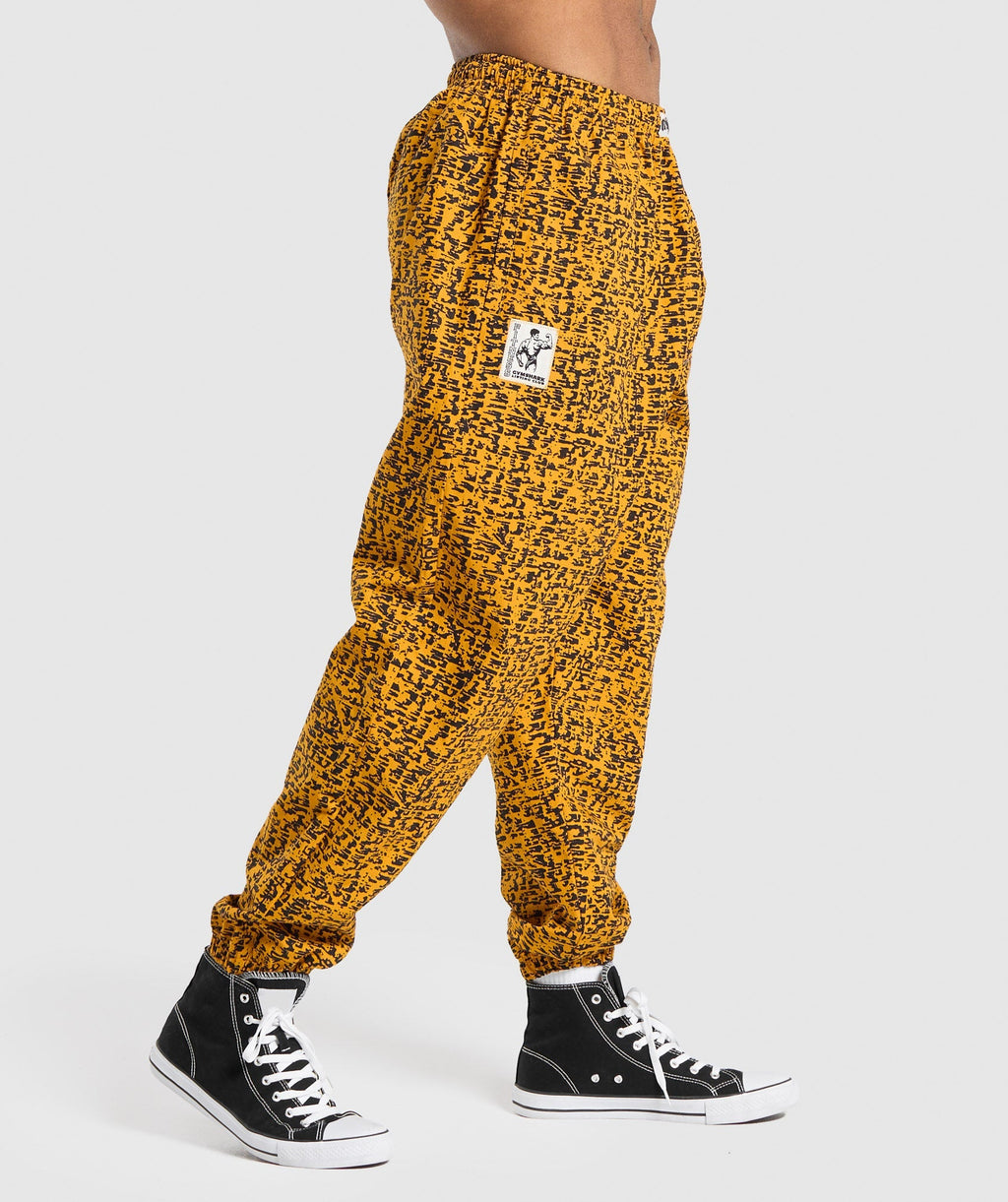 gymshark-printed-pumper-pants-burnt-yellow-ss24