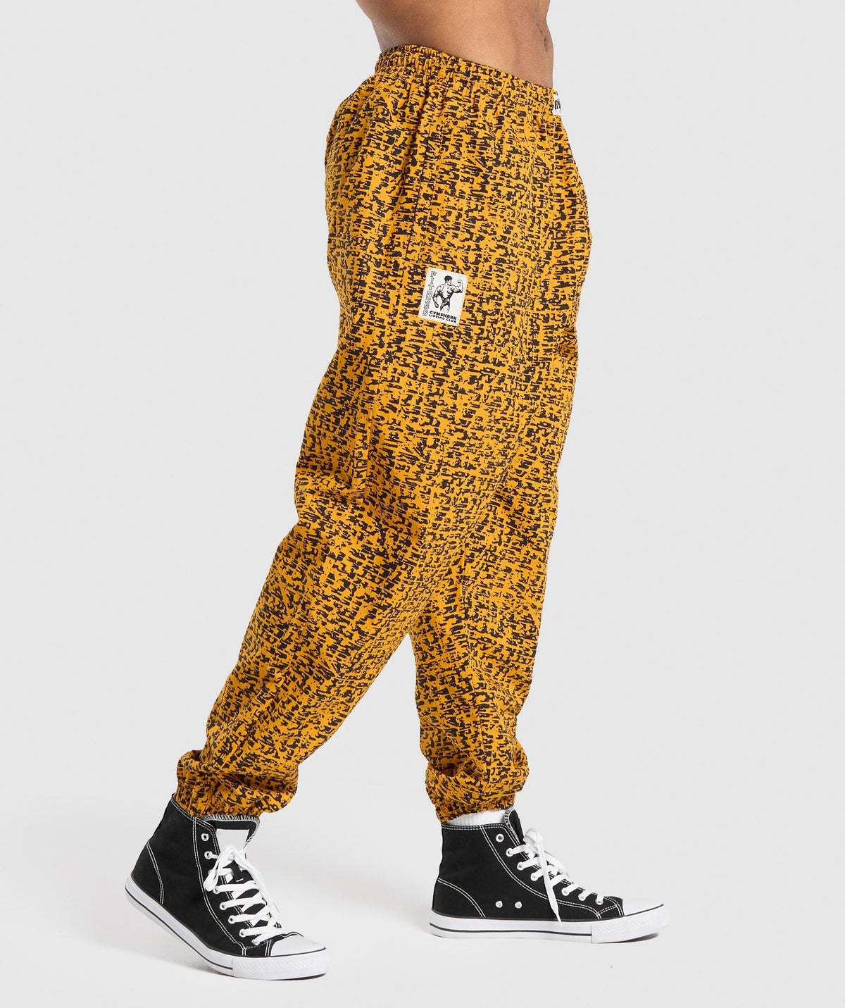 gymshark-printed-pumper-pants-burnt-yellow-ss24